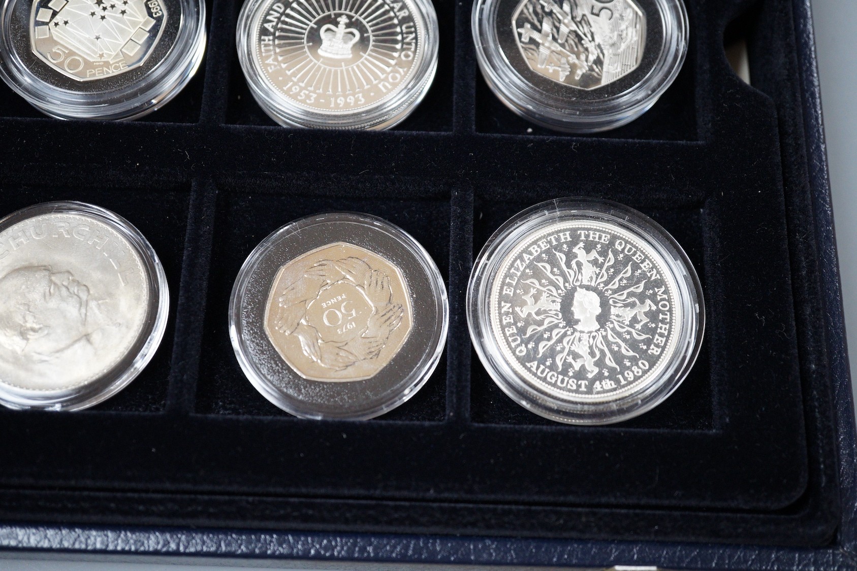 A group of Royal Mint UK commemorative silver proof coins, including 1996 Northern Ireland £1, 1983 royal arms £1, 1995 Welsh £1, 2005 Dictionary 250th anniversary coin, four minute mile 50p, 1997 £2, 50th anniversary D